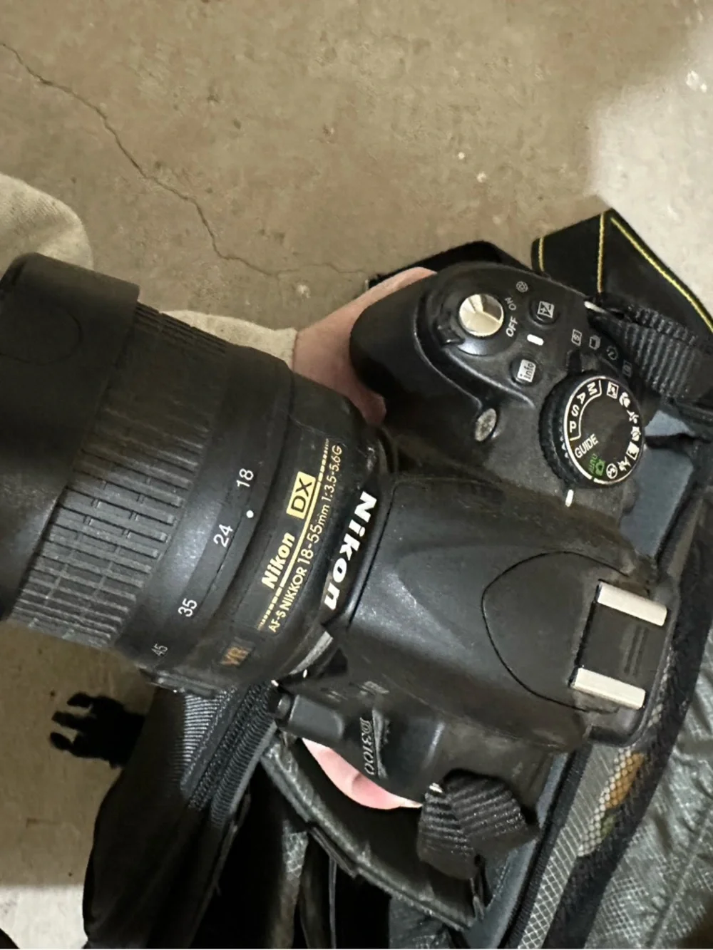 Nikon D3100 DSLR Camera Kit in Black and Yellow-Accented Strap